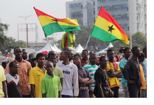 File photo: The Ghanaian flag, and people