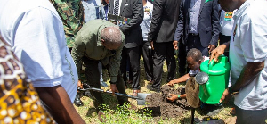 President John Dramani Mahama leading the tree planting exercise
