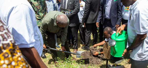 President John Dramani Mahama leading the tree planting exercise