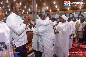 Stephen Adom Kyei-Duah embracing Dr. Mahamudu Bawumia