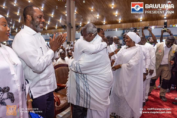 Stephen Adom Kyei-Duah embracing Dr. Mahamudu Bawumia