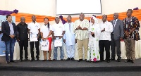 Some of the awardees in a group photograph with Dr Siaw Agyapong (6th left) and other officials
