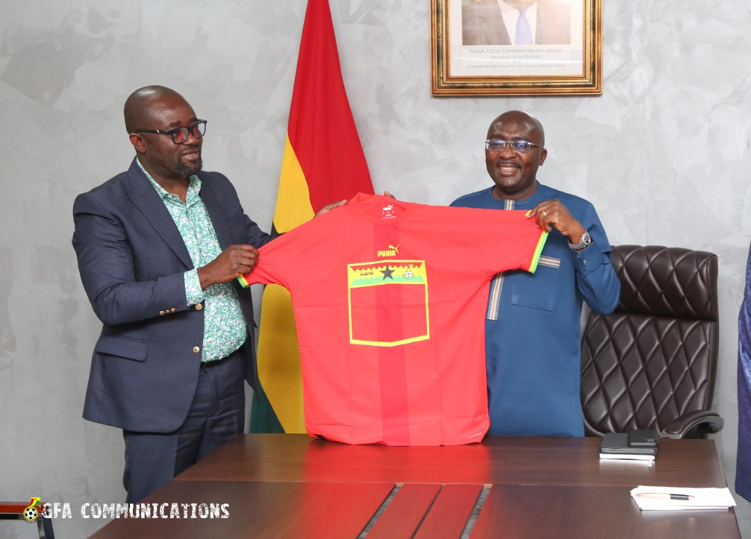 Vice President Dr. Mahamudu Bawumia holding the new Black Stars jersey