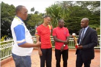 Ghanaian CAF official Kofi Addae with Ugandan reps