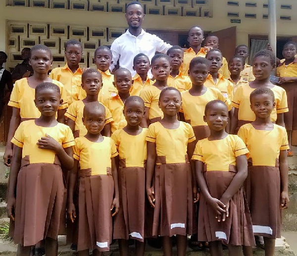 Teacher Kwadwo used his salary to sew new uniforms for 18 pupils