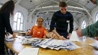 People cast their vote inside a polling station during the legislative elections in Rabat