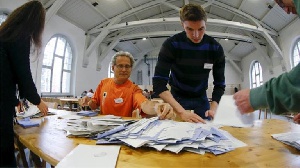 People cast their vote inside a polling station during the legislative elections in Rabat