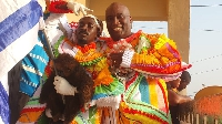 MP for Essikado-Ketan Mr.Joe Ghartey with one of the masqueraders