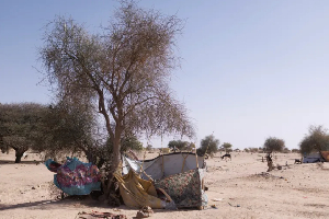 Makeshift shelters at a refugee transit camp by Chad's border with Sudan
