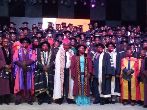 Officials of Accra Business School with the graduands