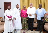 President Rawlings poses with the delegation