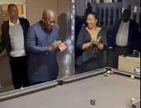President Mahama (in kaftan attire) was excited to watch kids play snooker