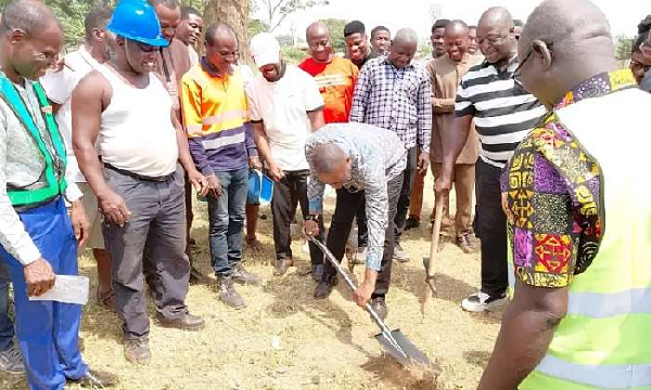 Professor Kingsley Nyarko breaking grounds for the project to begin