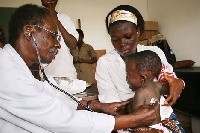 File photo of a doctor assessing a child
