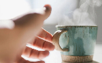 A steaming cup of hot tea