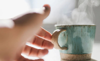 A steaming cup of hot tea