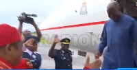 The Asantehene descending the jet to meet his friend, the Esama of Benin Kingdom