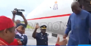 The Asantehene descending the jet to meet his friend, the Esama of Benin Kingdom