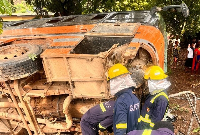 GNFS officials on scene of an accident in the Volta Region involving a Metro Mass Transit bus