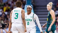 Amy Okonkwo celebrating a bucket with Kunaiyi