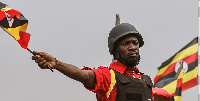 Uganda’s opposition leader Bobi Wine is seen waving the Ugandan flag