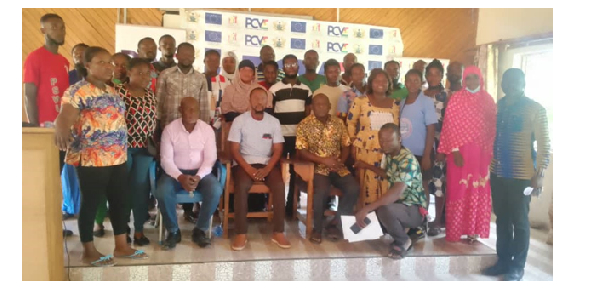 Participants pose for a photo after the meeting