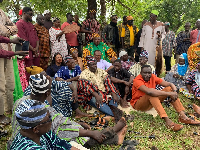 Hajia Zuwera Mohammed Ibrahimah seated in the company of the  Paramount Chief and some sub-chiefs