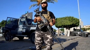 A member of an armed group affiliated with Libya's Ministry of Interior