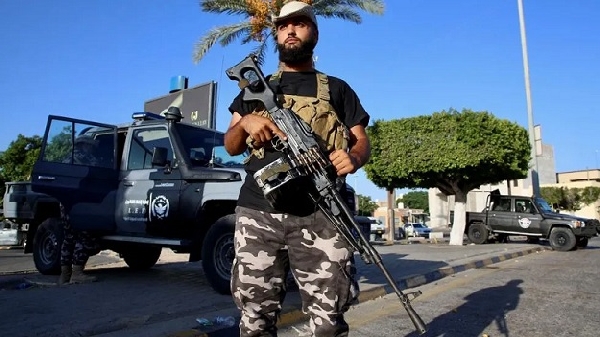 A member of an armed group affiliated with Libya's Ministry of Interior