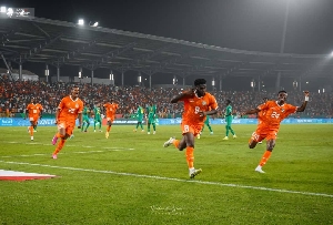 Ivorian players celebrate after Kessie's wining penalty