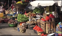 A photo of food stuffs on sale at a market