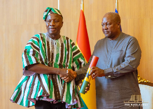 Mahama Ayariga (L) with President John Dramani Mahama (R)