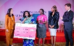 Management of Kempinski present dummy cheque to BCI Ghana
