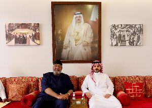 Alhaji Sinare with the Bahrain official during their encounter