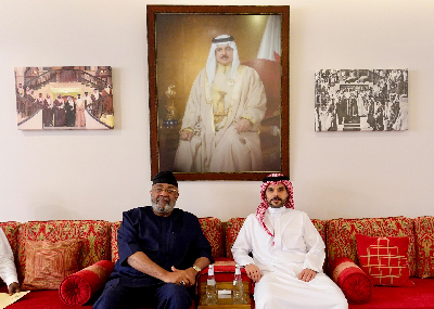 Alhaji Sinare with the Bahrain official during their encounter