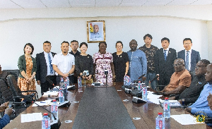 Chinese delegation in a photograph with the minister