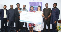 Ministry officials captured in photo receiving €415,000 cheque