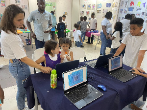 Some students with their projects on display