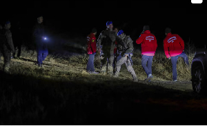 Turkish security forces and search and rescue teams work around the crash site