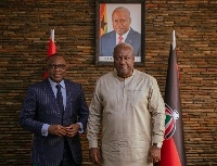 French Ambassador to Ghana, Jules Armand Aniambossou [L] and President-elect of Ghana, John Mahama