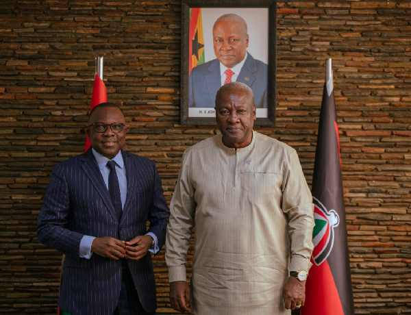 French Ambassador to Ghana, Jules Armand Aniambossou [L] and President-elect of Ghana, John Mahama