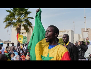 A protester chants anti-gay slogans during a demonstration against homosexuality