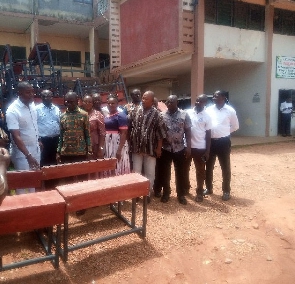 The MCE presents the desks to GES