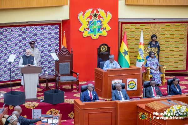 The framed Kente behind the Speaker of Parliament were gifted by the Asantehene