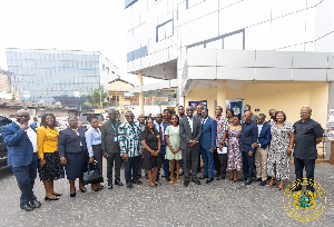 Finance Minister Dr Ato Forson with the staff of the Osu Tax Service Centre