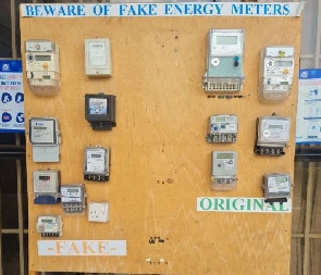 A display of fake meters alongside the original ones on a notice board