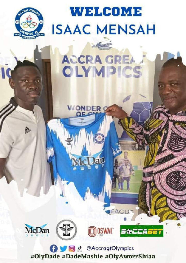 Midfielder, Isaac Mensah with a club official