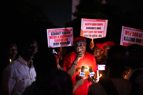 Henry Akoto Osei speaking during the dumsor protest at Kumasi