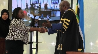 Peninah Malonza shakes hands with EALA Speaker Joseph Ntakirutimana