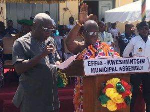 Municipal Chief Executive, Kojo Acquah [hands held high]